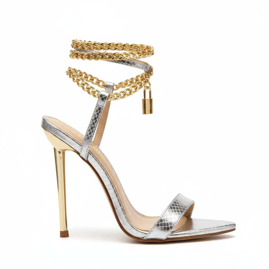 Silver high-heeled sandals with gold accents 