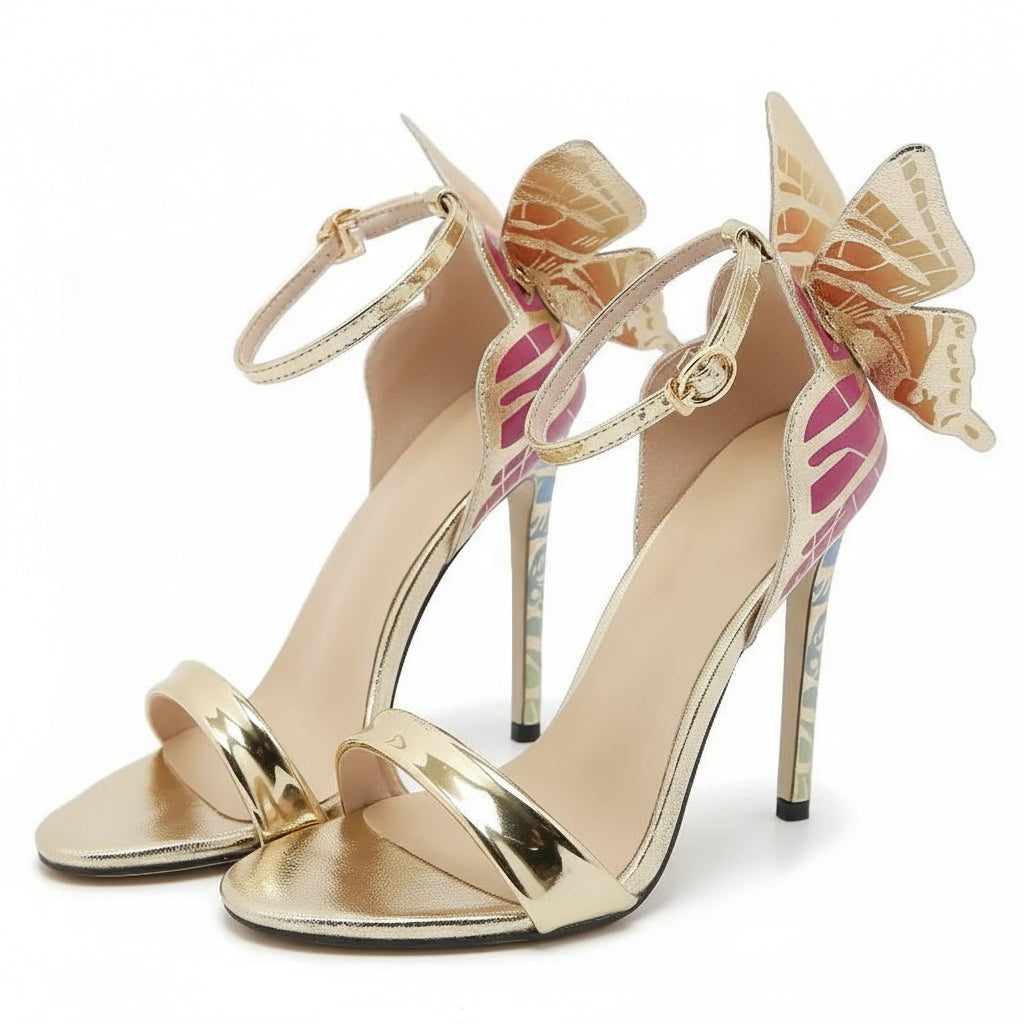 Gold high-heeled sandals with pink and gold butterfly 