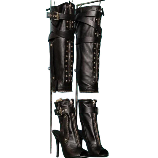 Black leather knee-high boots with studded details 