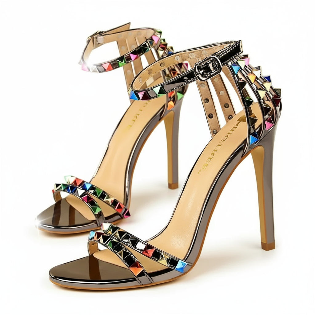 Grey high-heeled sandals with colorful gemstones
