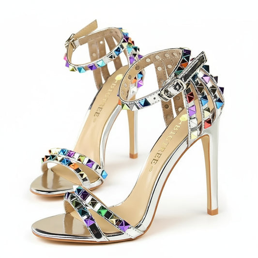 Silver high-heeled sandals with colorful gemstones