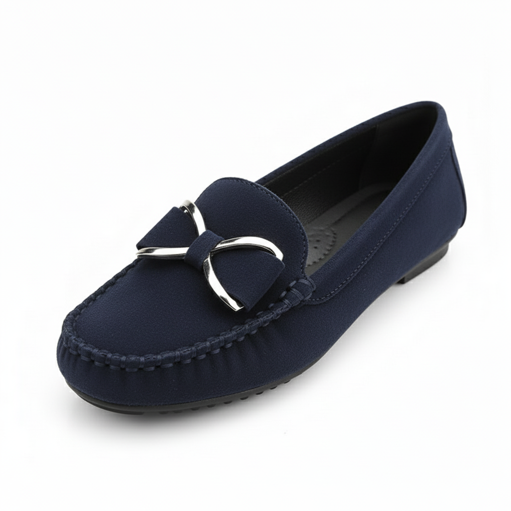 Navy blue loafers with a gold buckle on a white surface