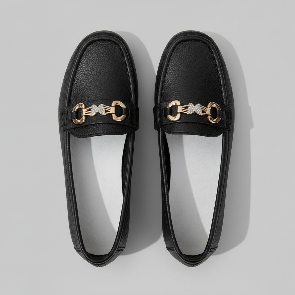 Black loafers with gold accents 