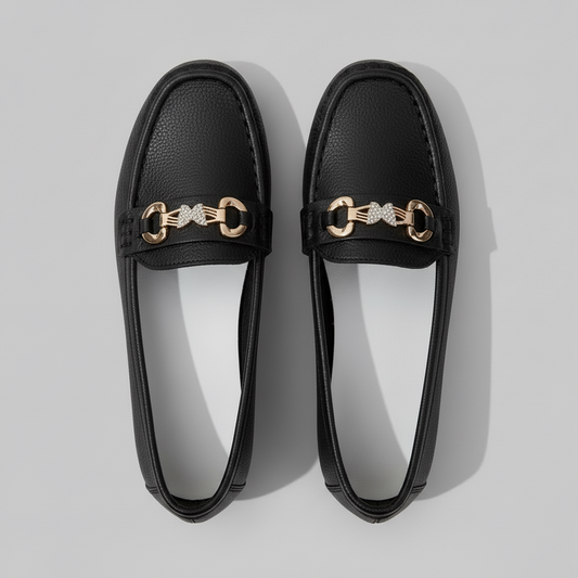 Black loafers with gold accents 