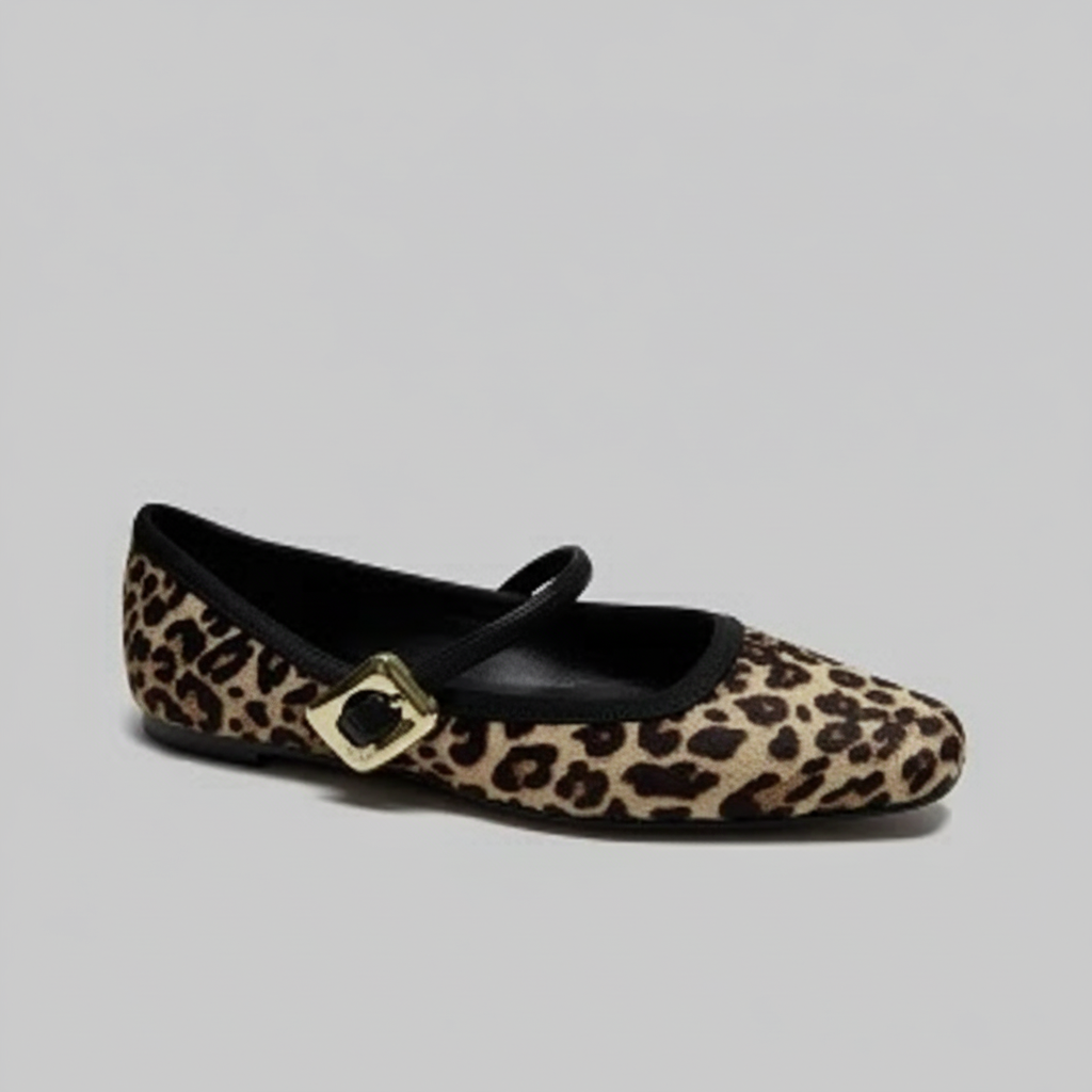 Leopard print flat shoe with a gold buckle.
