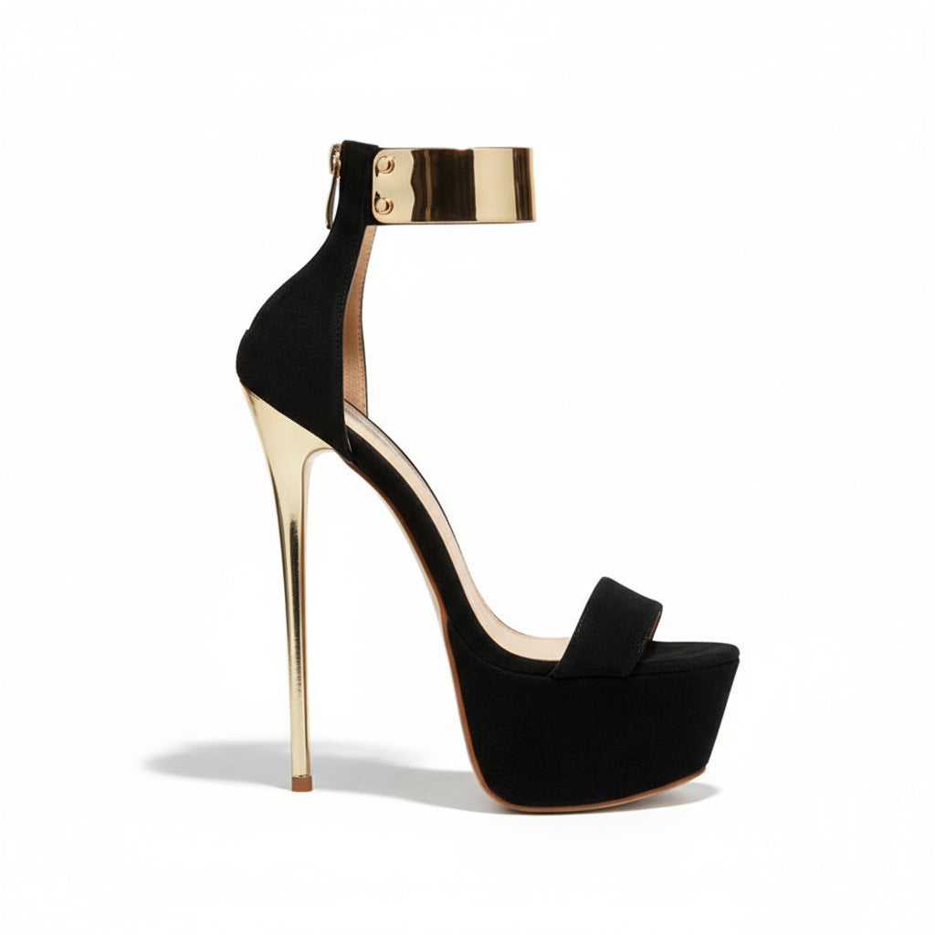 Black high-heeled sandal with gold platform.